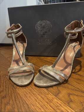 Vince Camuto Metallic T-Strap Heels in Gold Snake-Emboss